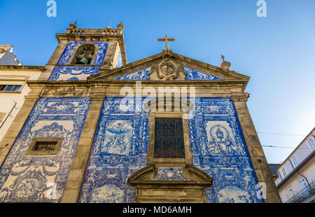 Traditional historic facade in Porto decorated with blue hand painted tin-glazed tiles, Oporto, Portugal Stock Photo