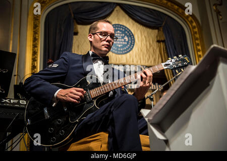 180323-F-PW498-001 BANGKOK, THAILAND (Mar. 23, 2018) Airman First Class Pete Somerville, a regional guitarist assigned to the U.S. Air Force Band of the Pacific, performs at a gala at the Mandarin Oriental Hotel in Bangkok, Thailand. The band is in Thailand as part of the U.S. Embassy’s 200th Anniversary Celebration of Friendship between the U.S. and Kingdom of Thailand. (U.S. Air Force photo by Technical Sergeant Mariko Frazee/Released) Stock Photo