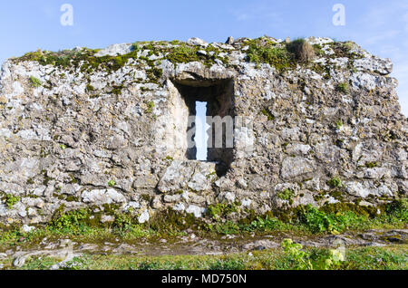 Small window opening in the old town wall at Tenby in Pembrokeshire, Wales Stock Photo