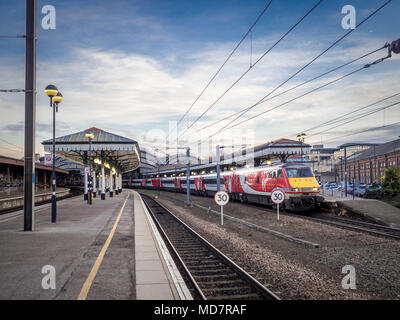 Virgin trains high speed engine on track at York railway station, UK. Stock Photo