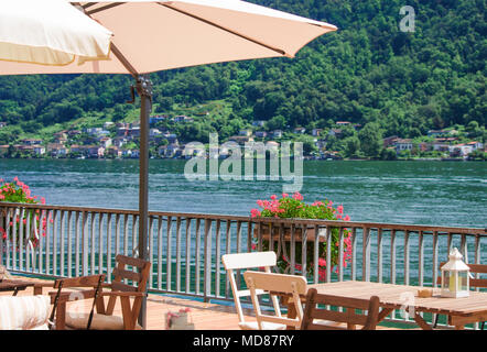 panoramic terrace where you can sip a drink while enjoying the view. Lugano lake, switzerland Stock Photo