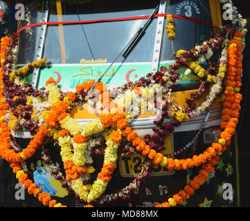 Marigold garlands adorning a tuktuk in Margao near Benaulim, Goa, India Stock Photo