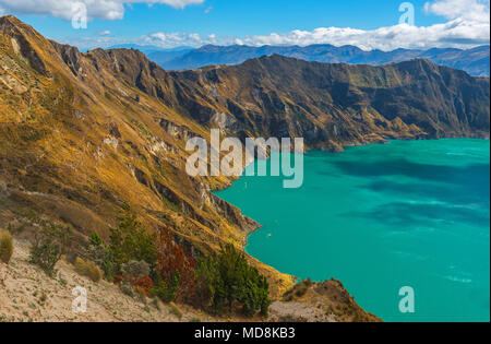 Landscape of the Quilotoa crater lake with its turquoise blue waters in the Andes mountain range near Quito, Ecuador, South America. Stock Photo