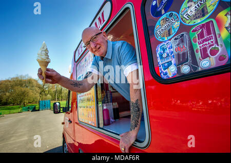 Bolton, UK. April 19, 2018. Glorious sunshine saw the crowds flock to Moss Bank Park in Bolton this afternoon on what is expected to be the hottest day of the year so far. Temperatures are set to reach the mid 20's centigrade and the hot spell is going to last until the weekend. Ice cream man John McLaren enjoyed a busy day in the park. Picture by Paul Heyes, Thursday April 19, 2018. Credit: Paul Heyes/Alamy Live News Stock Photo
