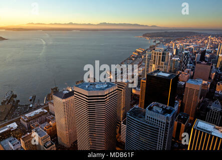 WASHINGTON - Sunset view to the west and north over downtown Seattle, the waterfront ,Elliott Bay, Puget Sound and the Olympic Mountains.2012 Stock Photo