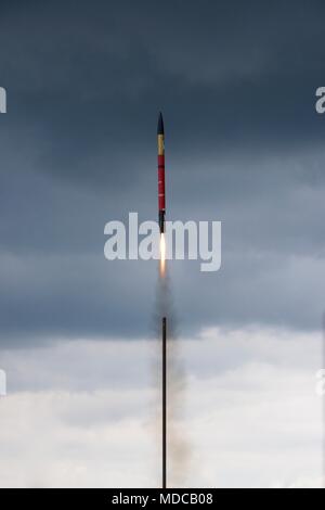 Liftoff of a liquid fueled rocket built by high school students as part of a STEM program. It hurdles towards its final apogee at 1 mile altitude. Stock Photo