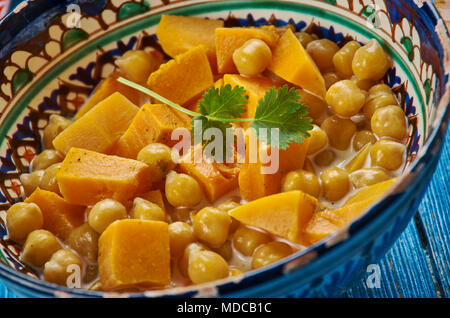 Moroccan cuisine, Chickpea Squash Tagine, Traditional assorted Moroccodishes, Top view. Stock Photo