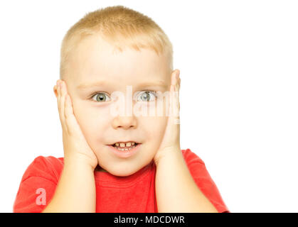 Surprise concept - boy with funny amazed expression on white background Stock Photo