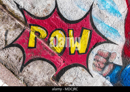 Comic speech bubble with expression text "Pow". Vector bright dynamic cartoon graffitiin retro pop art style. Stock Photo