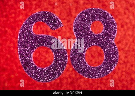 Number sixty-eight purple color over a red background. Anniversary. Horizontal Stock Photo