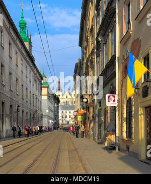 Lviv, Lviv Oblast / Ukraine - 2010/04/12: Lviv historic city center, Old Town quarter and Market Square with Carmelite Church and Museum Street Stock Photo