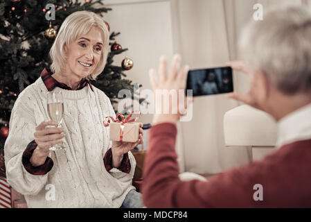 Pretty mature woman posing on camera Stock Photo