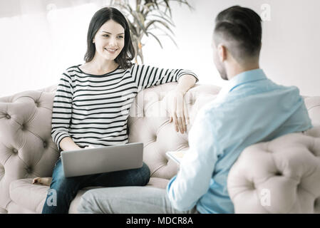 Brunette two friends communicating Stock Photo
