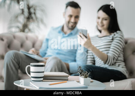 Happy two colleagues taking break Stock Photo