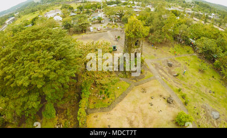 Aerial views the ruins of Cagsawa church, showing Mount Mayon erupting in the background. Cagsawa church. Philippines. Stock Photo