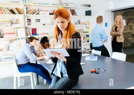 Businesswoman in modern office Stock Photo