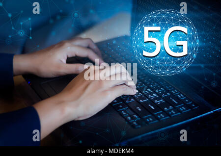 5G 4G Press enter button on the computer. Communication network World map send message Connect worldwide hand keyboard Communications network map of t Stock Photo