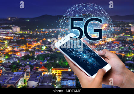 Business people use global communication phones in the 5g system Stock Photo