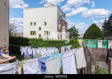 The Villa Muller is a building designed by Adolf Loos, Stresovice, Prague, Czech Republic Drying, Laundry on Clotheslines, yard Stock Photo