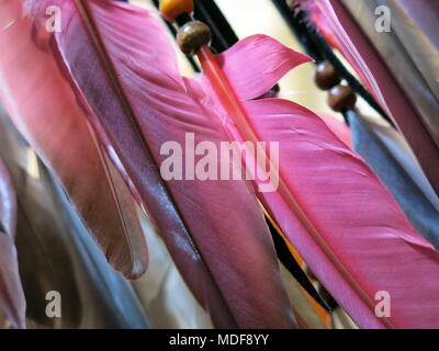 Feathers hanging from a dreamcatcher. Stock Photo