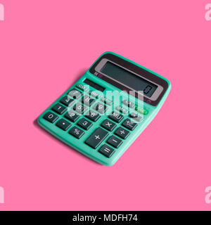 Vintage pocket calculator, with both battery and solar power, and math operations limited to multiplication, division, addition, subtraction and squar Stock Photo