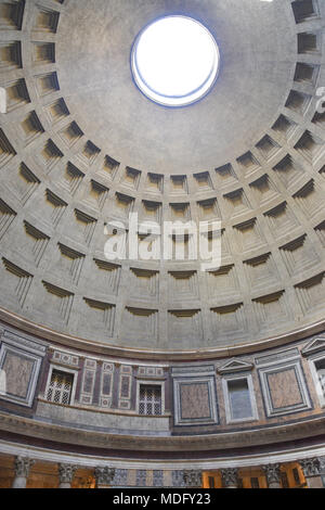 The oculus and coffered concrete dome of the Pantheon. It is the largest unreinforced concrete dome in the world. The Pantheon is a former Roman templ Stock Photo