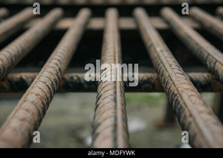 Selective focus of rusted reinforcing steel bar Stock Photo