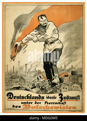 1919 German anti Bolshevik vintage historic old Bolshevism propaganda poster shows a gigantic Russian man standing on the burning ruins of a city.  'Germany's ideal future under the leadership of the Bolsheviks' Stock Photo