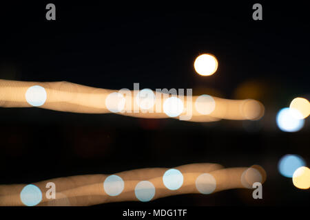Converging abstract gloden color lines with defocused glowing dots motion blur Stock Photo