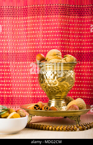 Ramadan Sweets - Mix of nuts on wooden table Stock Photo