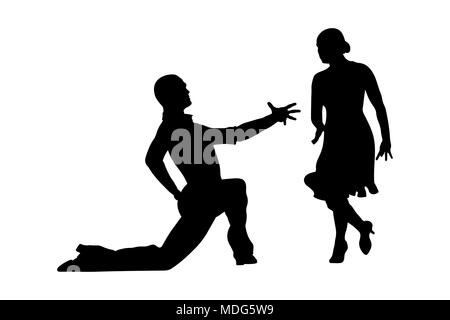 male dancer on one knee in female latin american dancing Stock Photo