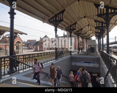 Main railway station in Gdansk Poland, a busy transport hub, underpass and roofed access to the tracks Stock Photo