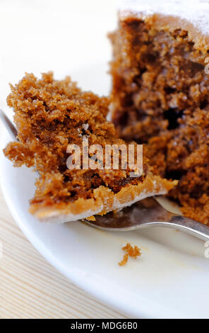 sticky toffee cake on white plate Stock Photo