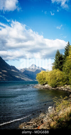 Mountains rise on all sides of Lake Wakatipu near Queenstown, South Island, New Zealand. Stock Photo