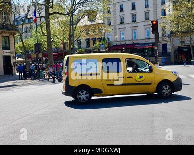 French postal service, electric delivery vehicle at Paris intersection. Paris, France. Stock Photo