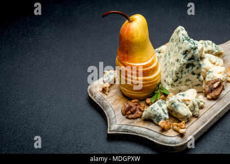 Slice of French Roquefort cheese and pear Stock Photo