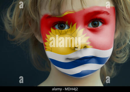 Child with a painted flag of Kiribati Stock Photo