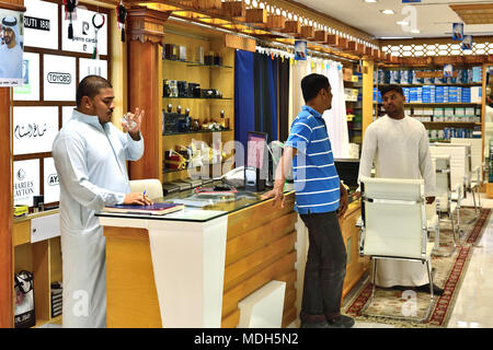 Ajman, UAE - April 9. 2018. Shop of mens traditional Arabic clothing Stock Photo