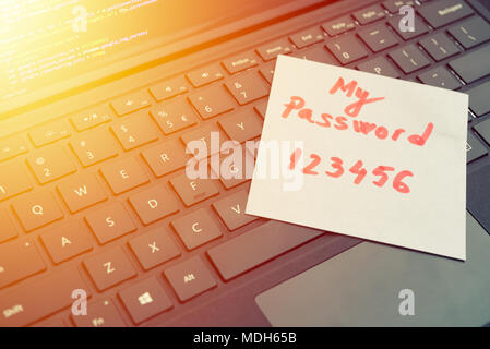 My password 123456 message concept written post it on laptop keyboard Stock Photo