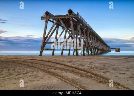 The disused Steetley Pier was built to serve the former Hartlepool Magnesia Works which has now been demolished; Hartlepool, County Durham, England Stock Photo