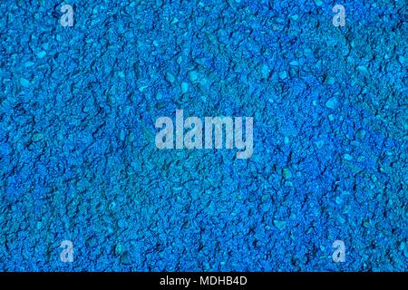 ultra blue Oil spill on asphalt road, abstract background or texture foe web site or mobile devices. Stock Photo