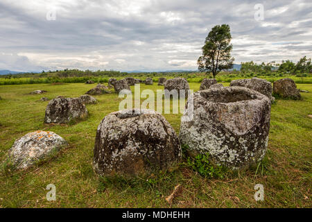Megalithic stone jars at Site 1, Plain of Jars; Xiangkhouang, Laos Stock Photo