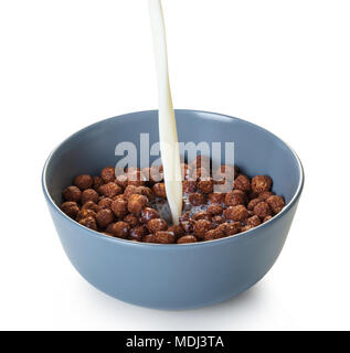 cereal balls with cocoa in milk on white isolated background Stock Photo