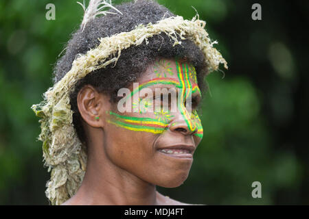 Tanna, Republic of Vanuatu, July 12th, 2014: Portrait of an indigenous woman with traditional paint Stock Photo