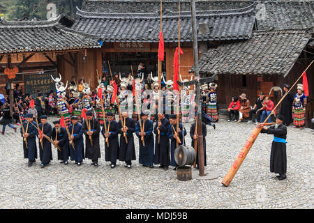 Langde, China - March 27, 2018: People of the Miao ethnic minority performing a traditional dance in Langde Miao Nationality  village, Guizhou provinc Stock Photo