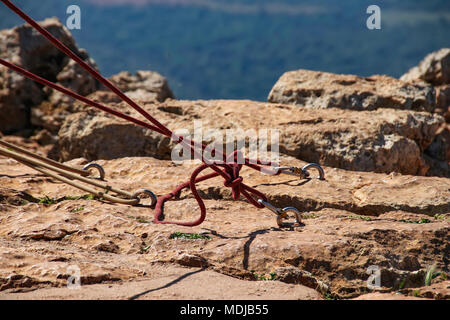 Jumpers with tied ropes is slaughtered in stone . Stock Photo
