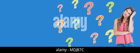 Woman thinking with colorful funky question marks Stock Photo