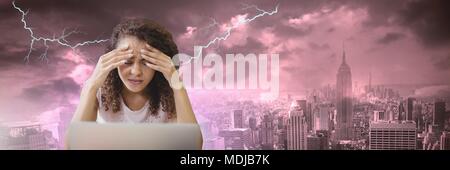 Lightning strikes and stressed woman with headache holding head Stock Photo