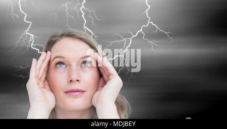 Lightning strikes and stressed woman with headache holding head Stock Photo