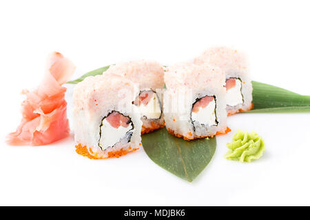 Exquisite, appetizing sushi rolls with salmon and Philadelphia cheese with crab meat mousse. Isolated. Sushi roll on a white background. Sushi Japanes Stock Photo
